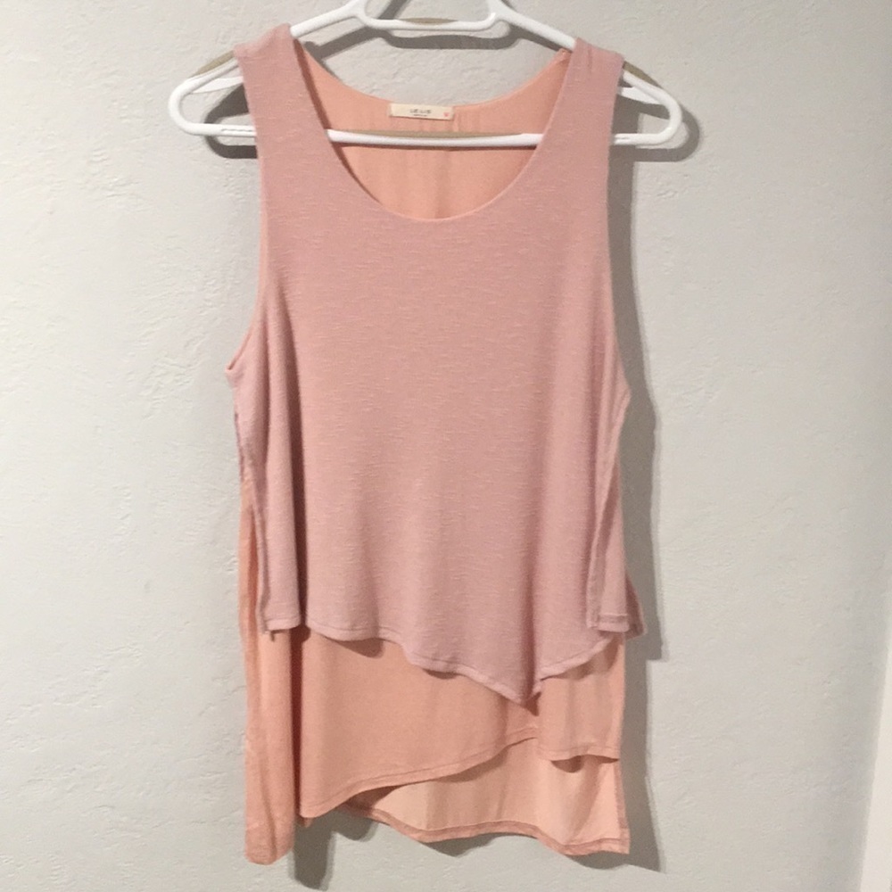 🌸sleeveless tunic.